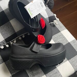 CROCS Women's Black Mules with Red Floral Accent